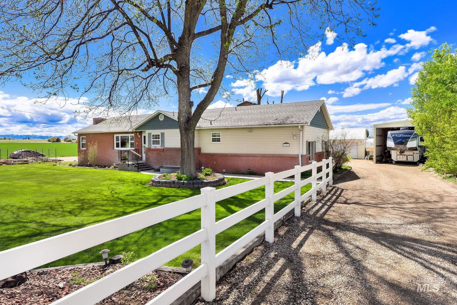 Idaho rural landscape with farmland and mountains — DSCR financing for investment properties outside the Treasure Valley